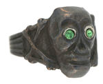 SKULL RING WITH GREEN EYES FROM 1939 AND LIKELY A POPSICLE PREMIUM.