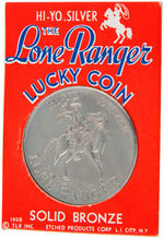 "THE LONE RANGER LUCKY COIN" ON CARD WITH "STATION WXYZ" MAILER.