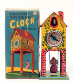 "CUCKOO SWINGING CLOCK" BOXED WIND-UP BY BANDAI.