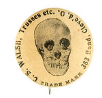 SKULL IMAGE FORMED BY TWO YOUNG CHILDREN AND DOG EARLY BUTTON FOR "TRUSSES" DEALER.