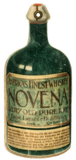 "AMERICAS FINEST WHISKY NOVENA" FIGURAL CELLULOID MEMO TABLET.