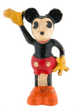 “LIONEL MICKEY MOUSE CIRCUS” TOY WIND-UP TRAIN WITH MICKEY CIRCUS BARKER FIGURE.