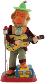 "ROCK'N ROLL MONKEY" BOXED BATTERY-OPERATED TOY.