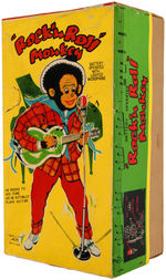 "ROCK'N ROLL MONKEY" BOXED BATTERY-OPERATED TOY.