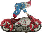 ACROBATIC CLOWN ON MOTORCYCLE WIND-UP.