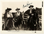 CESAR ROMERO & ROD CAMERON/JENNIFER HOLT SIGNED PHOTO PAIR.