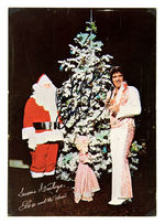 ELVIS PRESLEY SIGNED CHRISTMAS POSTCARD.