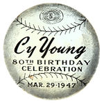 FIGURAL BASEBALL STIFF CELLULOID BADGE FOR "CY YOUNG 80TH BIRTHDAY CELEBRATION."