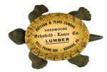 TURTLE WITH LUMBER CO. CELLULOID SHELL FIGURAL PAPERWEIGHT.