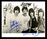 "THE ROLLING STONES" SIGNED PHOTO.