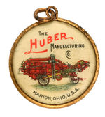 "THE NEW HUBER" CHOICE COLOR TWO-SIDED CELLULOID CHARM.