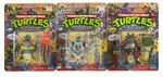 "TEENAGE MUTANT NINJA TURTLES" CARDED ACTION FIGURE LOT OF EIGHT WITH CASE.