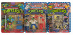 "TEENAGE MUTANT NINJA TURTLES" CARDED ACTION FIGURE LOT OF EIGHT WITH CASE.