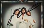 JOHN TRAVOLTA SIGNED "SATURDAY NIGHT FEVER" LP ALBUM COVER.