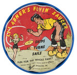 “LI’L ABNER’S SPESHUL BRAND ORANGEADE” JUICE CAN AND “FLYIN’ SAUCER” FRISBEE.