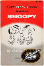 PEANUTS SNOOPY BOOK WITH CHARLES SCHULZ SIGNATURE & SNOOPY SKETCH.