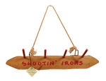 "SHOOTIN' IRONS" WOOD PISTOL RACK.