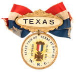 CELLULOID AND BRASS BADGE WITH RIBBON ACCENT FROM "W.R.C." FOR "STATE FAIR OF TEXAS AT DALLAS."