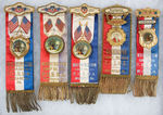 PATRIOTIC ORDER SONS OF AMERICA GROUP OF FIVE ELABORATE RIBBON BADGES WITH CHOICE COLOR CELLULOIDS.