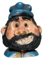 BLUTO FIGURAL STRING HOLDER.