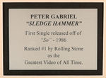 PETER GABRIEL SIGNED "SLEDGEHAMMER" MAXI SINGLE RECORD COVER FRAMED DISPLAY.