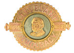 EXCEPTIONAL 1884 CLEVELAND LARGE BRASS BADGE WITH FABRIC ACCENT.