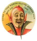 MAN IN DEVIL'S COSTUME REPRISES HIMSELF THIS TIME WITH INVITE TO "NORTH PLATTE STREET FAIR" BUTTON.