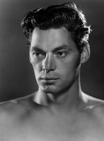 “JOHNNY WEISSMULLER” SIGNED CONTRACT FOR NOSTALGIA MERCHANT AUTOGRAPHED TARZAN PRINTS.