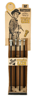 "BAT MASTERSON TWIRLING CANE" STORE DISPLAY WITH CANES.