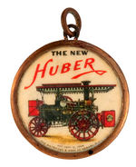 "THE NEW HUBER" DOUBLE SIDED CELLULOID CHARM.