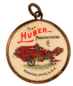 "THE NEW HUBER" DOUBLE SIDED CELLULOID CHARM.