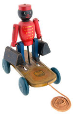 BLACK BELLHOP PULL TOY BY HUSTLER.