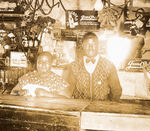 BLACK COUPLE BAR OWNERS REAL PHOTO POSTCARD PAIR.
