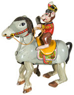 CIRCUS MONKEY ON HORSE TIN LITHO WIND-UP.