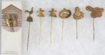 FARM MACHINERY GROUP OF SIX SCARCE STICKPINS PLUS ONE DUPLICATE.