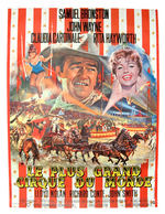 JOHN WAYNE "CIRCUS WORLD" FRENCH LINEN-MOUNTED POSTER.