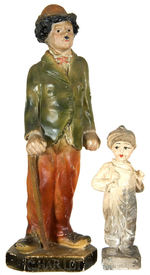 CHARLIE CHAPLIN AND JACKIE COOGAN PLASTER FIGURES PAIR.