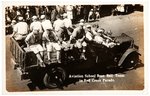 "AVIATION SCHOOL BASE BALL TEAM IN RED CROSS PARADE" VINTAGE REAL PHOTO POSTCARD.