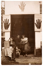 "PALMIST" REAL PHOTO POSTCARD PAIR.