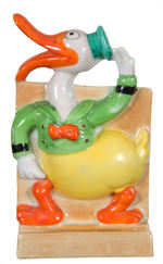 LONG-BILLED DONALD DUCK TOOTHBRUSH HOLDER (GLAZED BISQUE VARIETY).