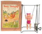 "BABY SWINGING" PRE-WWII BOXED WIND-UP.