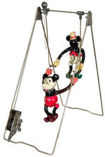 “MICKEY & MINNIE MOUSE AS ACROBATS” BOXED WIND-UP TOY.