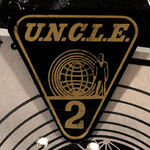 "THE MAN FROM U.N.C.L.E." BADGE DISPLAY.