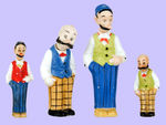 COMPLETE SET OF COMIC CHARACTER BISQUE NODDERS.