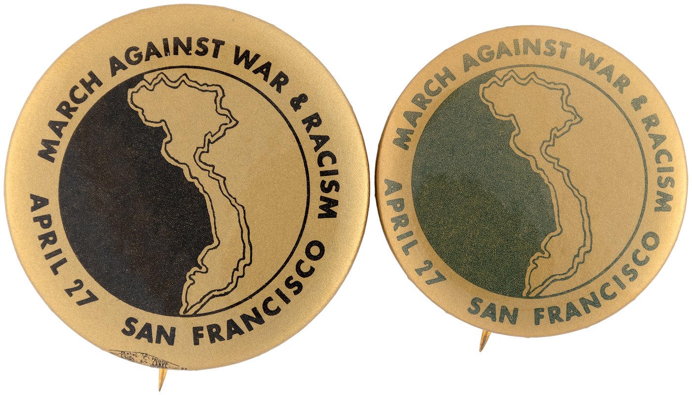 Hake's - "MARCH AGAINST WAR & RACISM" PAIR OF ANTI-VIETNAM WAR BUTTONS.