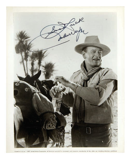 Hake's - John Wayne Signed Publicity Photo.